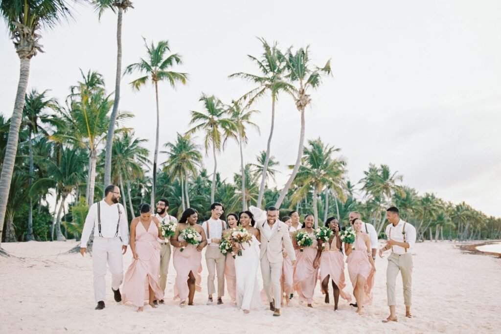 Elegant beach wedding dress beside the ocean with romantic sunset views. Travel Tips for Brides Wearing
