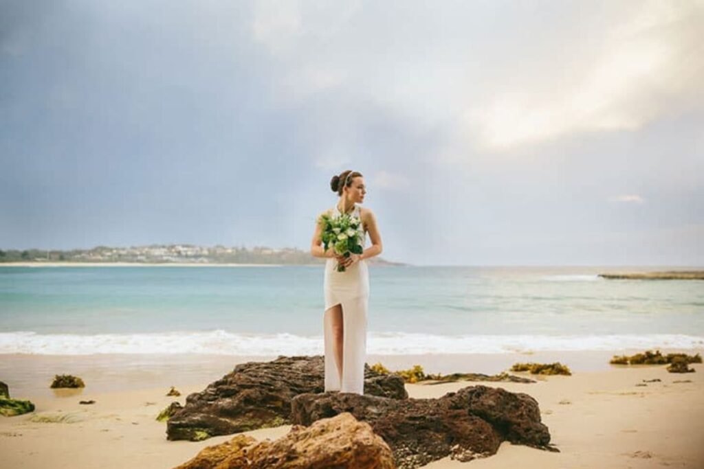 Hawaiian-inspired beach wedding dress with flower crown and seashell accessories. Beach Dresses
